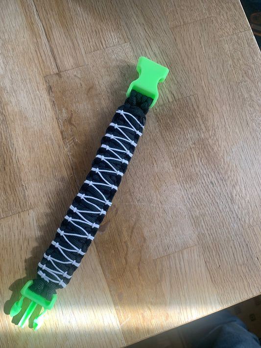 Paracord Bracelet  Black and White Stiched Neon Buckles 8"