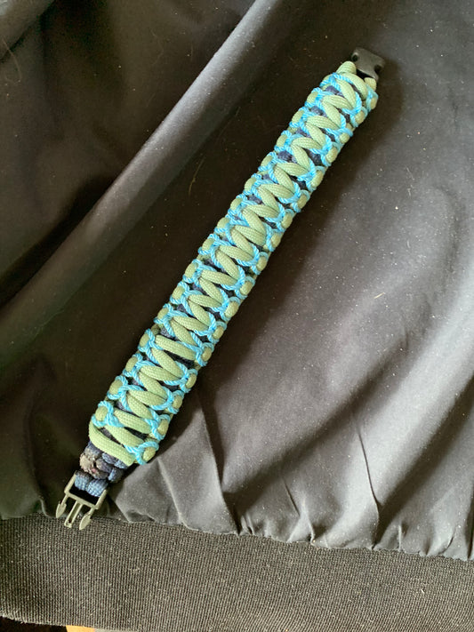 Paracord Bracelet Gray/Black with Light Blue Stiches Plastic Buckle 8"